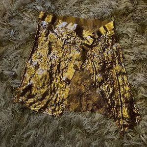 CHARITY ASYMMETRICAL MESH MINI SKIRT IN GOLD